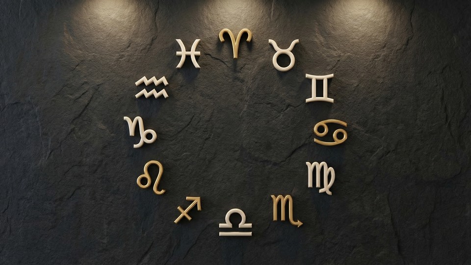 Symboler for de 12 stjernetegn på en mørk baggrund